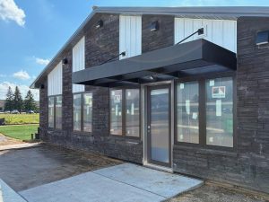Custom commercial metal canopy installation in Minnesota