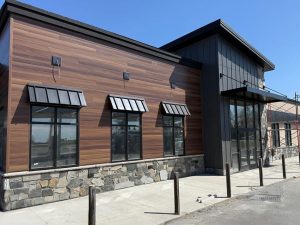 Metal awning over storefront entrance in Minnesota
