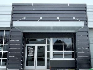 Metal canopy installed on commercial building in Minnesota