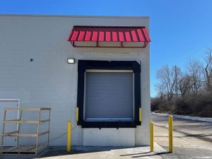 Custom metal awning installation by G&J Awning in Minnesota