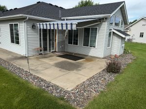 Retractable patio awning installed on Minnesota home by G&J Awning