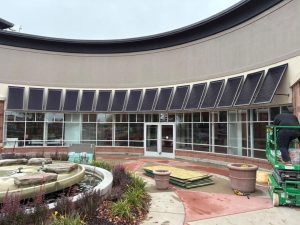 Custom Bahama shutters on windows in Minneapolis Minnesota