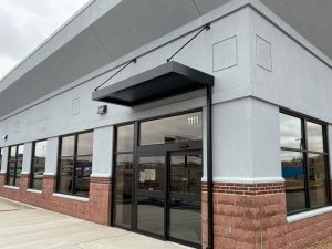 Metal overhang canopy installed on building in Minneapolis Minnesota